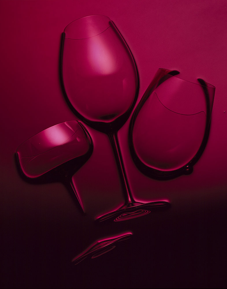 Three red wine glasses – Photograph by George Ong