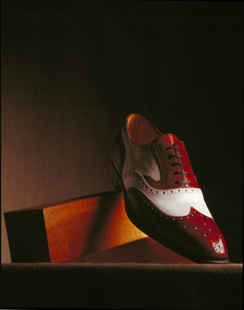Tan and white brogue shoe – Photograph by George Ong