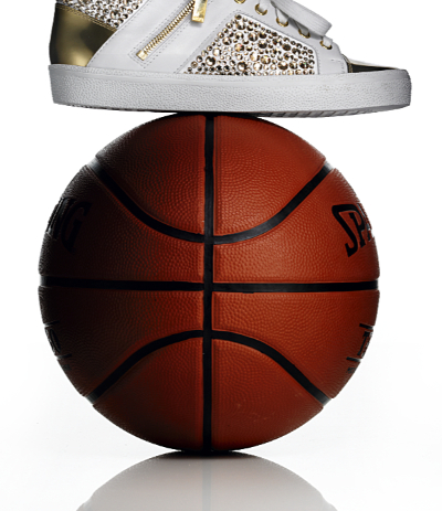 Diamond encrusted trainer on top of basketball – Photograph by George Ong